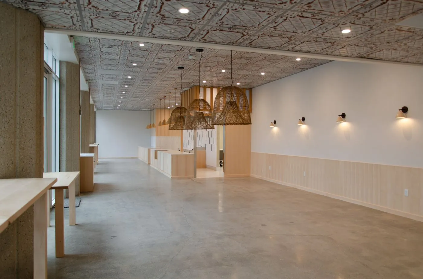 Freshroll dining space with maple plywood casework